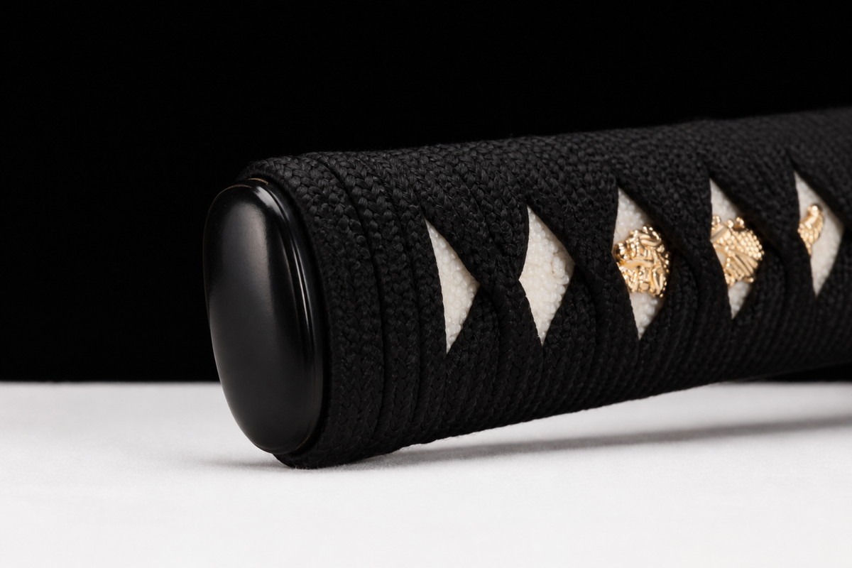 Shell-Inlay Wakizashi — Mirror-Polished 1065, Copper Fittings — kashira detail