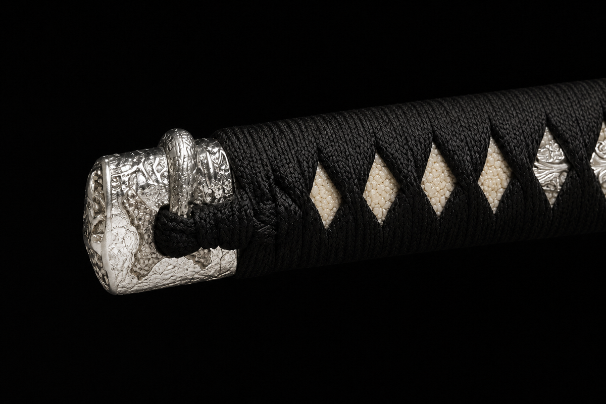Twisted-Grain Katana — Folded T8, White Eagle Saya — kashira detail
