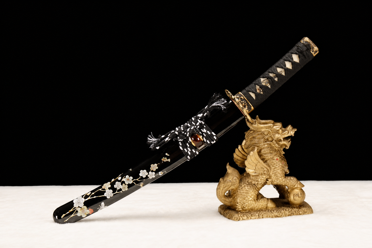 Plum Blossom Wakizashi — Sanmai T1095, Patterned Steel, Copper Fittings — sheathed on stand, angled view