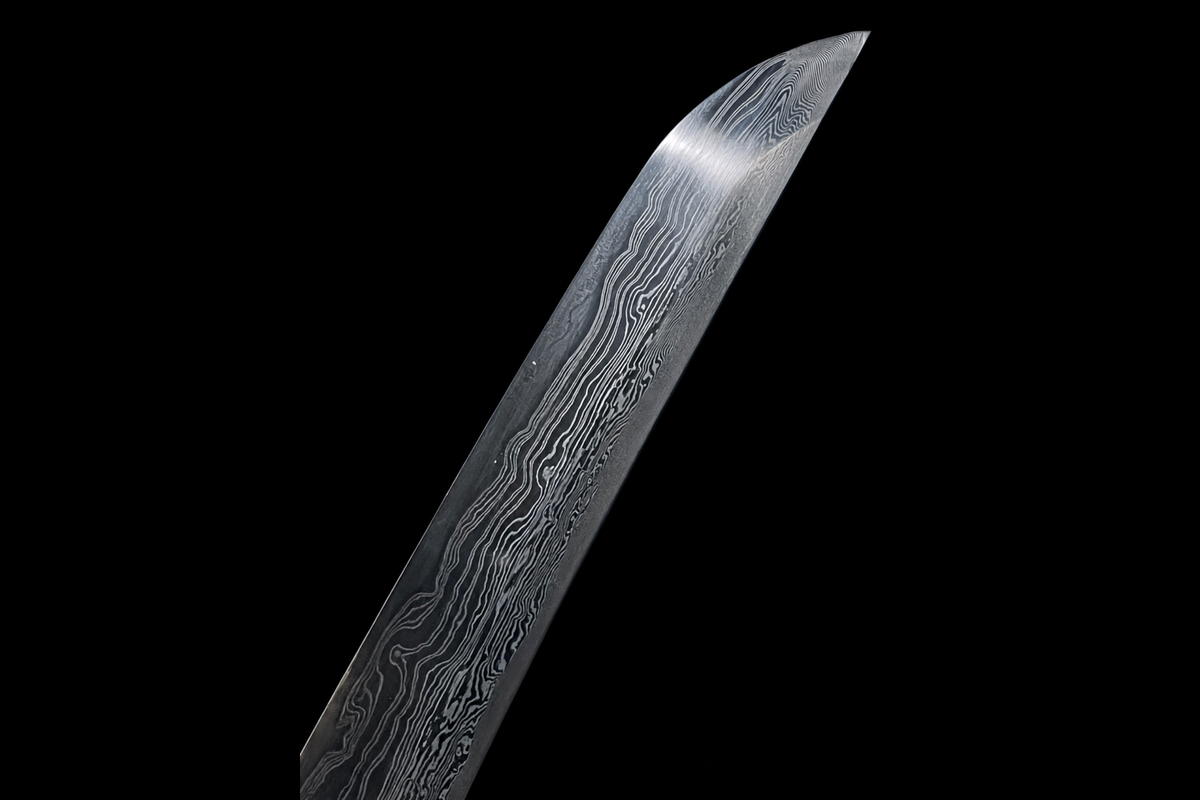 Plum Blossom Wakizashi — Sanmai T1095, Patterned Steel, Copper Fittings — kissaki grain detail