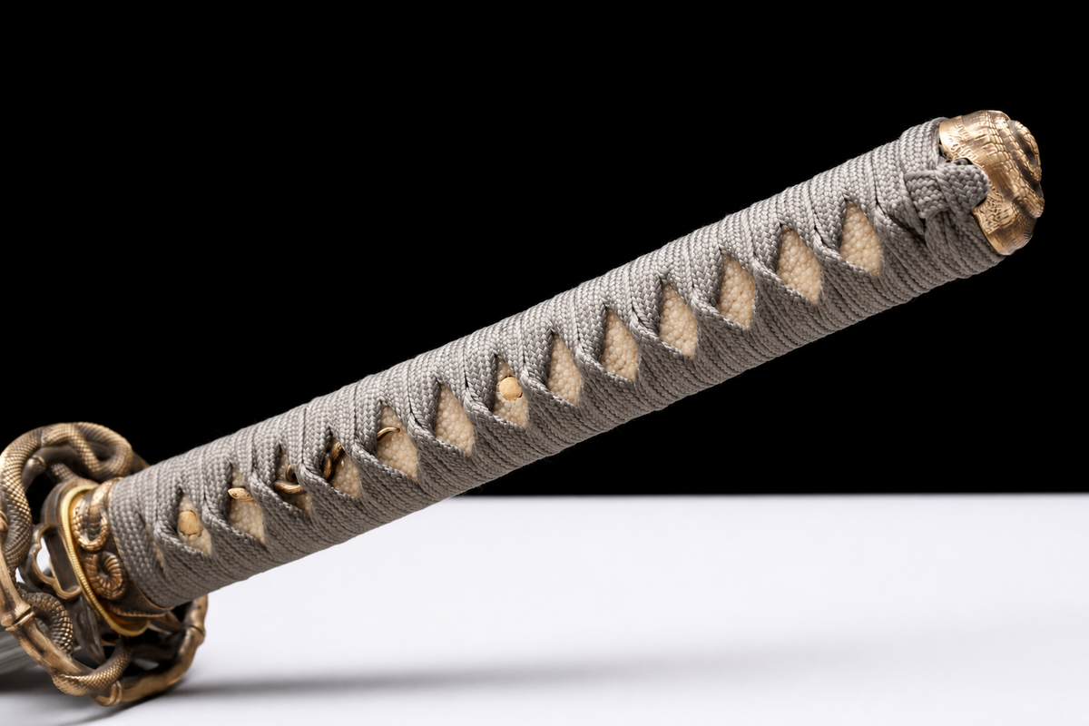 Golden Serpent Katana — Clay-Tempered T10, Bo-Hi — tsuka, tsuba and menuki detail