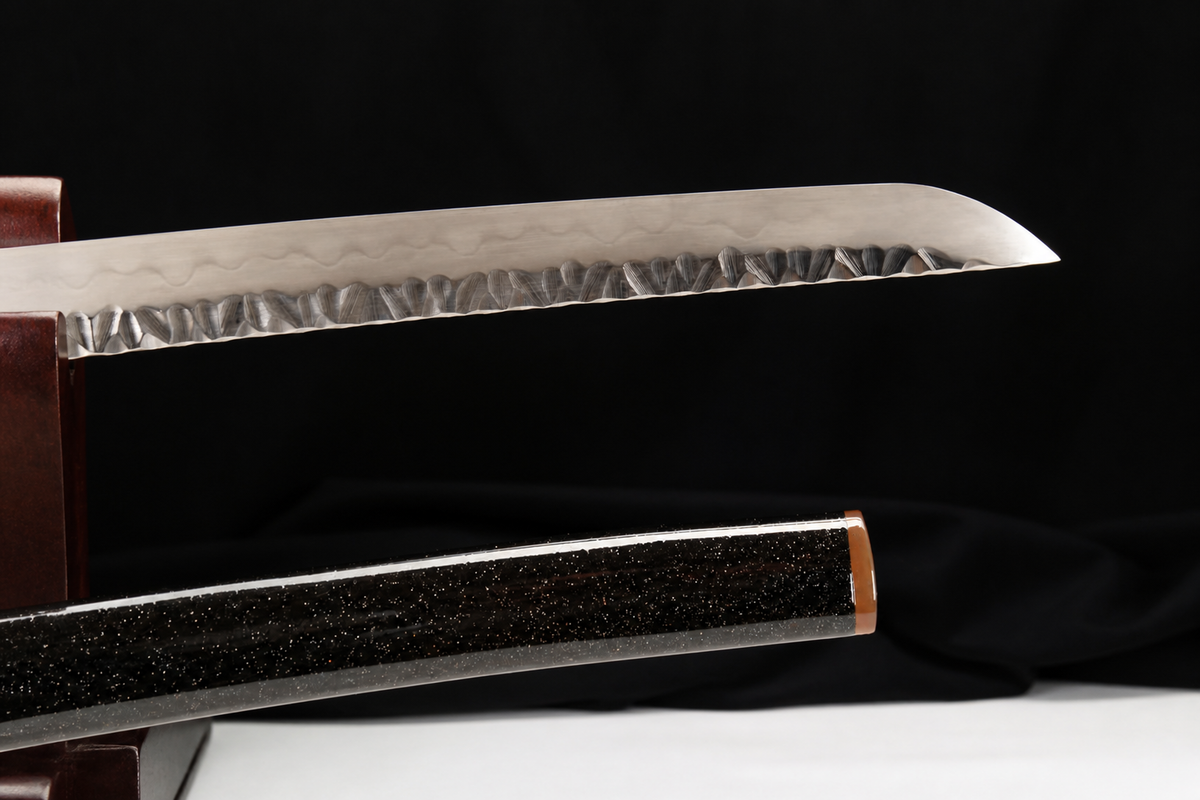 Dragon Maw Katana — Clay-Tempered T10, Hammered Finish, Horn Saya — kissaki and saya tip detail